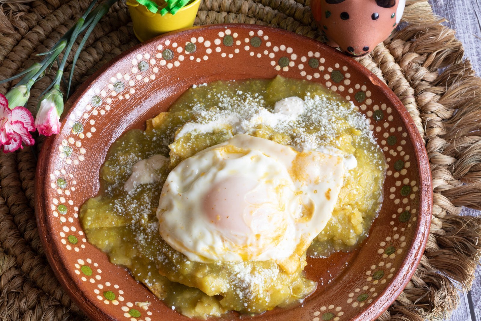 mexican-green-chilaquiles-with-over-medium-egg-2023-11-27-04-58-32-utc-scaled.jpg